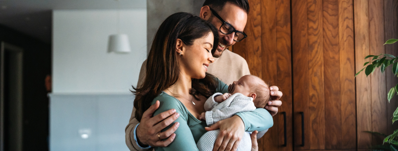 A couple with their new born baby